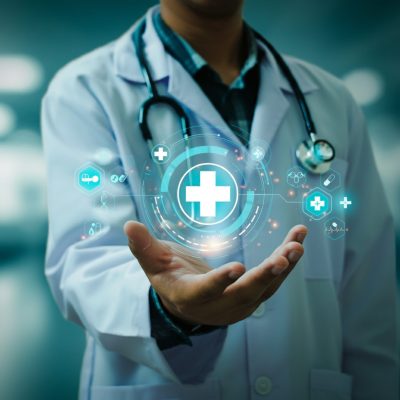 doctor-holds-medical-device-his-hands